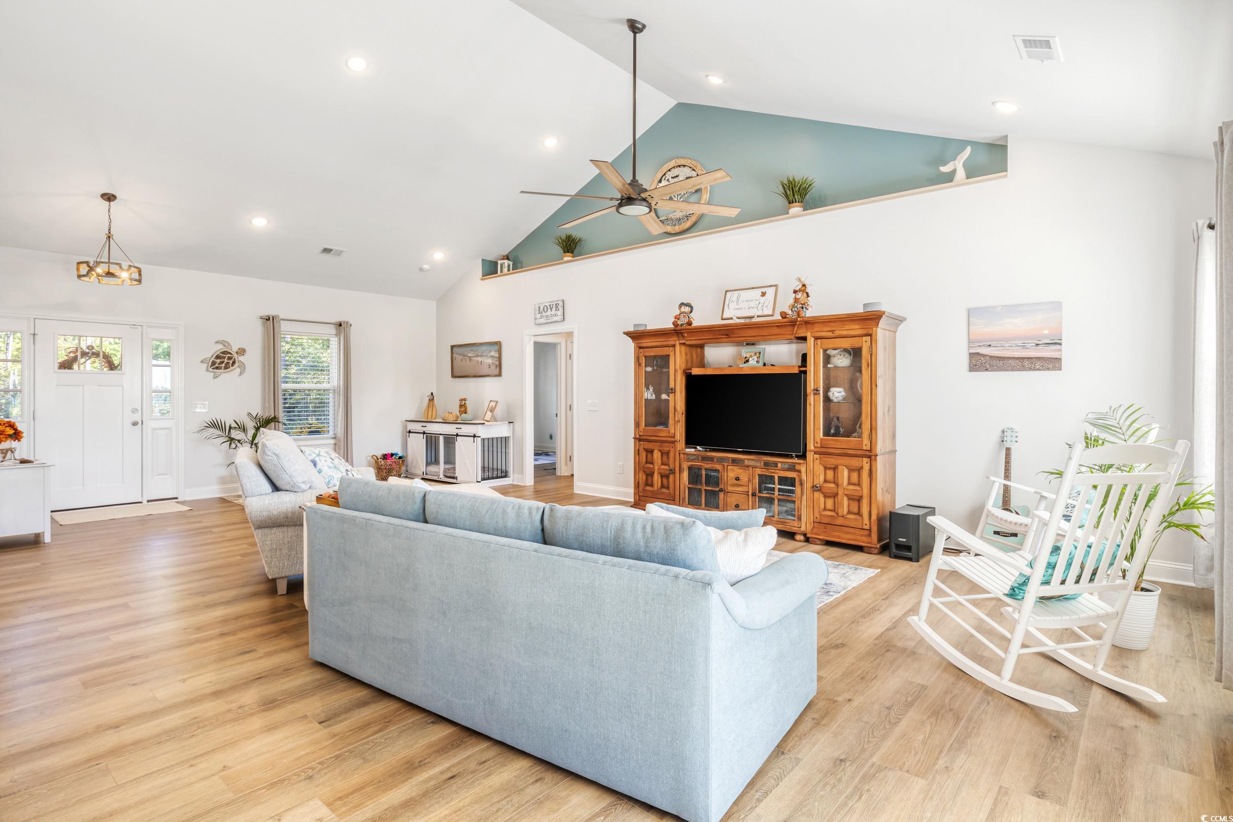 4082 Salem Road Aynor, SC 29511 - Photo 15 of 39 Living room with high vaulted ceiling, light wood-