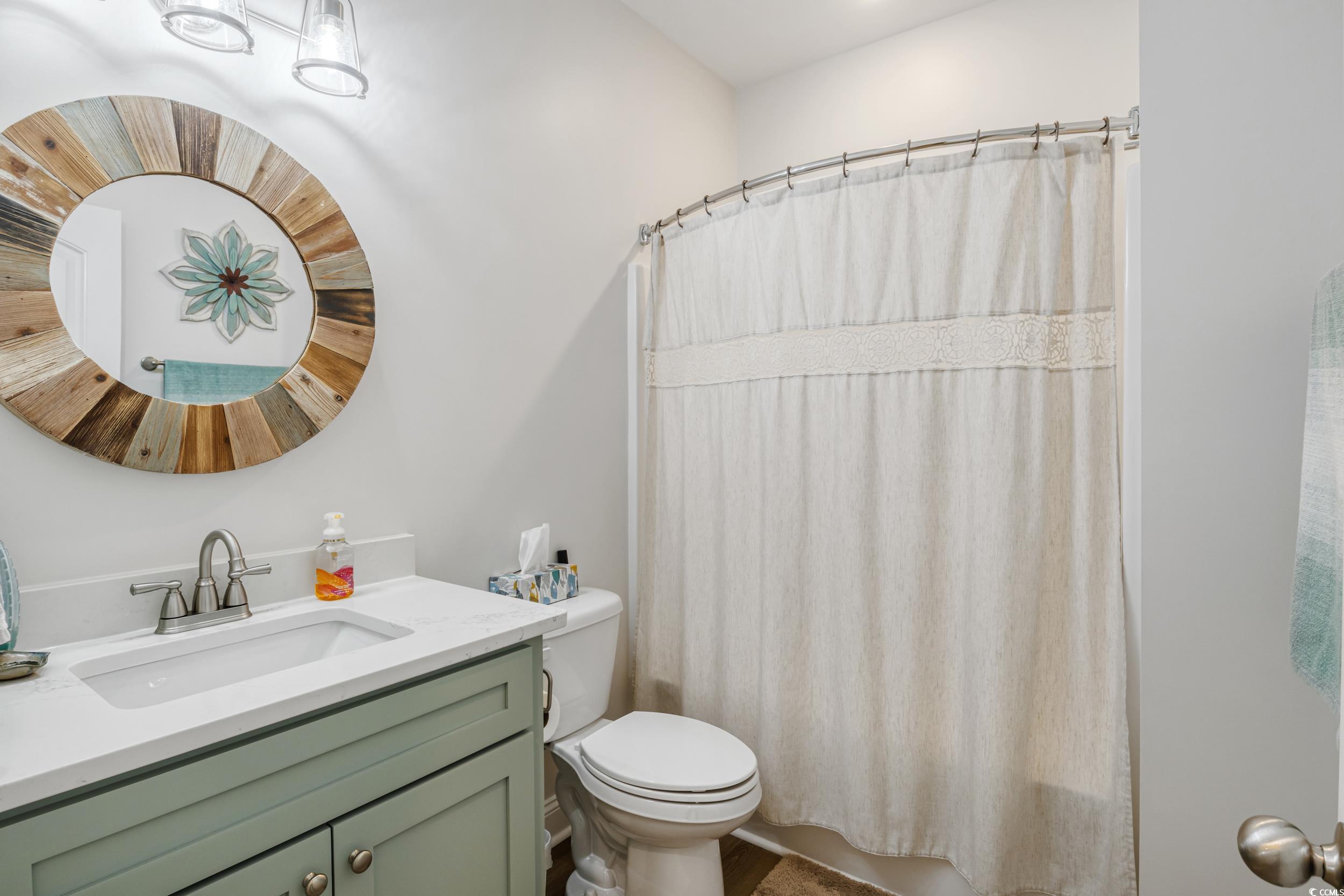 4082 Salem Road Aynor, SC 29511 - Photo 31 of 39 Bathroom featuring vanity, toilet, and a shower wi