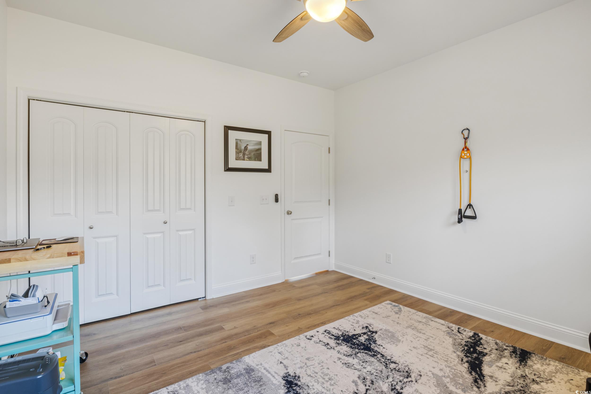 4082 Salem Road Aynor, SC 29511 - Photo 33 of 39 Bedroom with a closet, light wood-type flooring, a