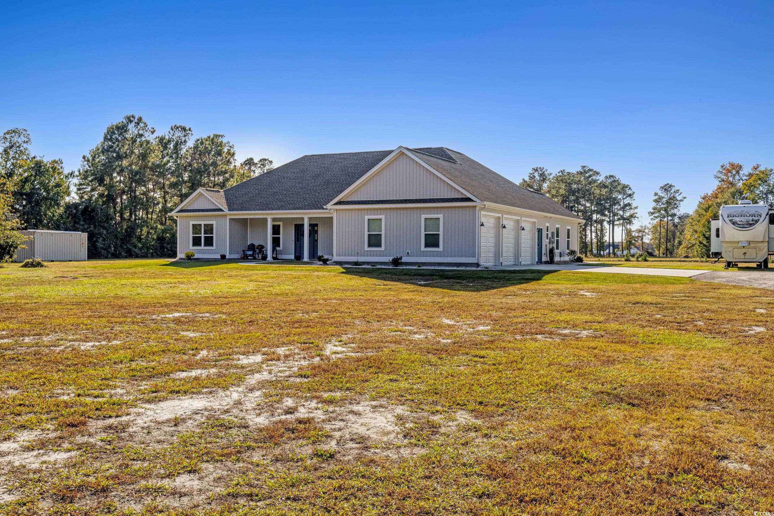View of front of house featuring a front lawn and