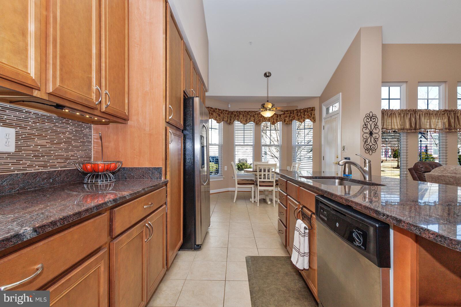 7224 Ivy Bank Road Laurel, MD 20707 - Photo 18 of 37 CERAMIC TILES FROM KITCHEN TO BREAKFAST AREA