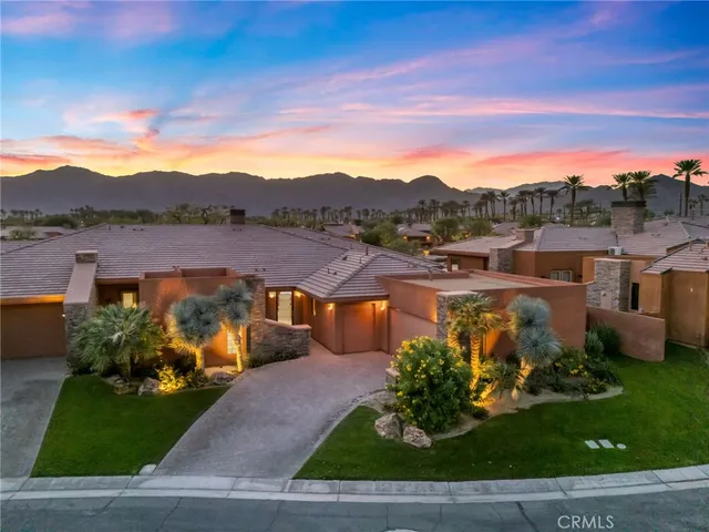 a view of a lake with a yard