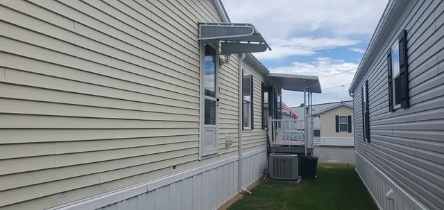 a view of backyard of a house