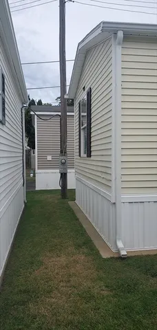 a view of a backyard of the house