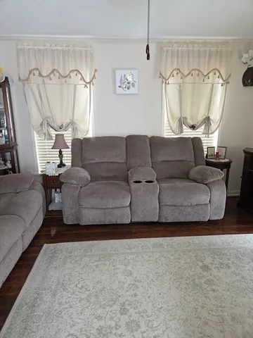 a living room with furniture and a couch