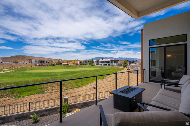 3606 South Cypress Road Hurricane, UT 84737 - Photo 67 of 69 Balcony with a fire pit, a mountain view, and golf course view