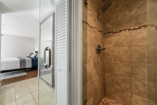 a bathroom with a sink and a shower