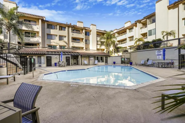 a view of a building with a swimming pool