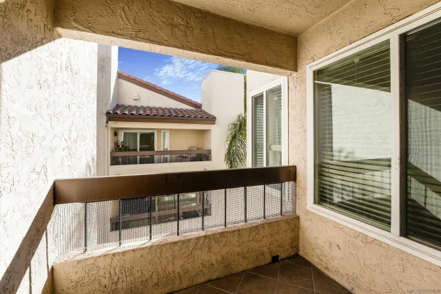 a view of a house with a large window