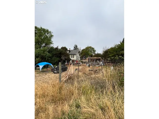 a view of swimming pool from a lake view