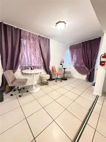 a living room with a couch and a table