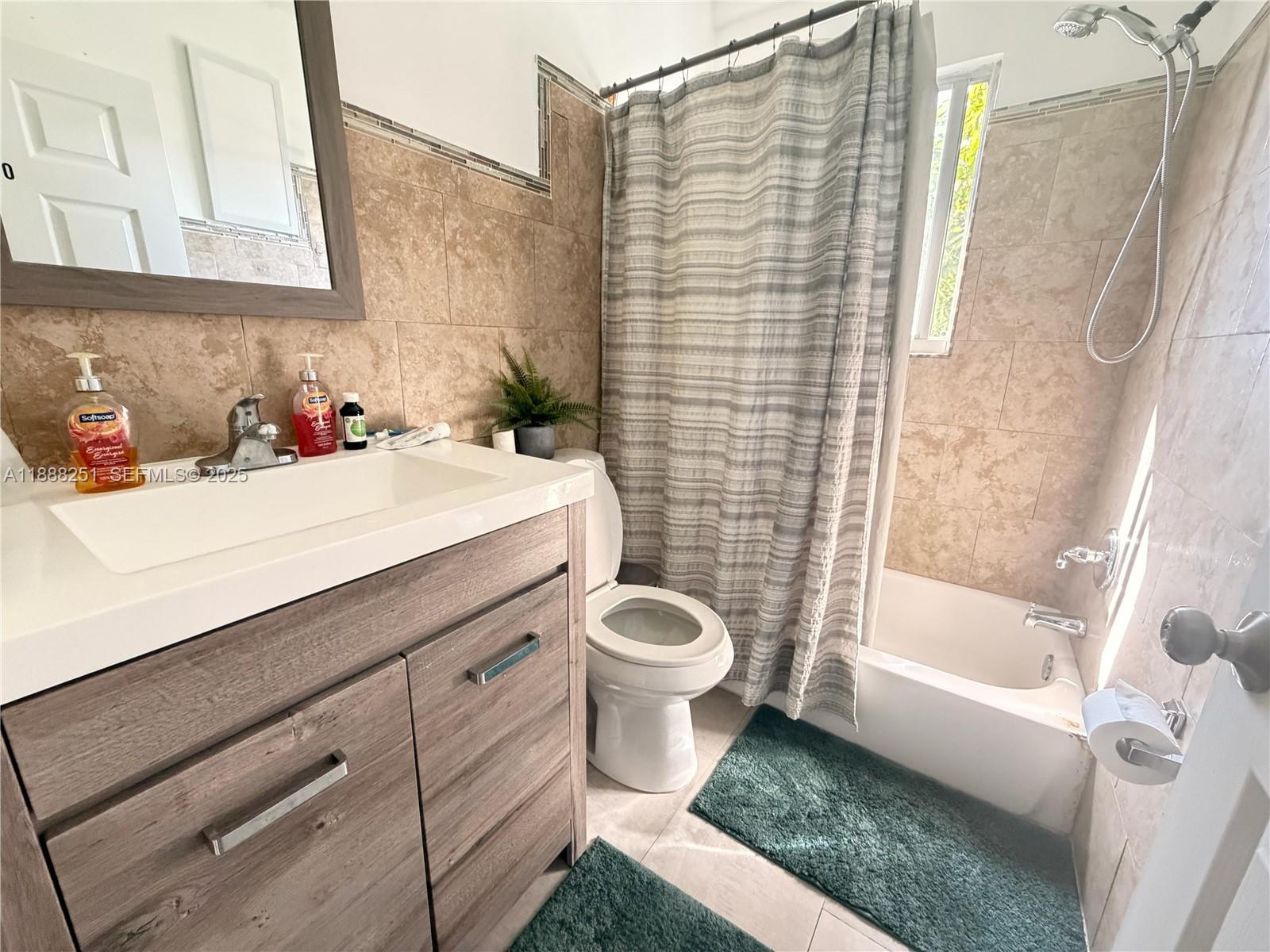 3 Southwest 7th Avenue Dania Beach, FL 33004 - Photo 25 of 25 a bathroom with a sink a toilet and shower