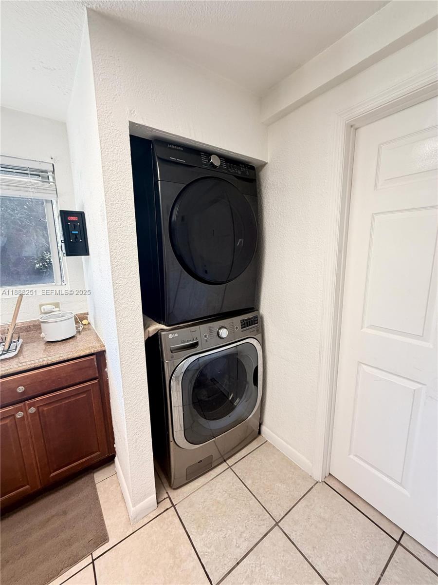 3 Southwest 7th Avenue Dania Beach, FL 33004 - Photo 8 of 25 a utility room with sink dryer and washer