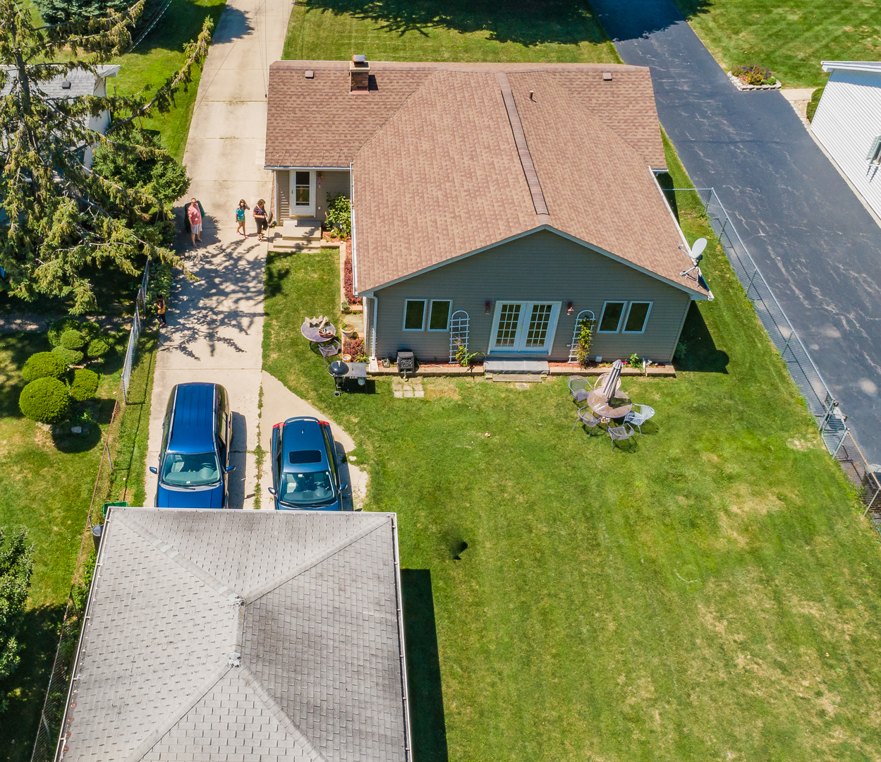 an aerial view of a house with swimming pool