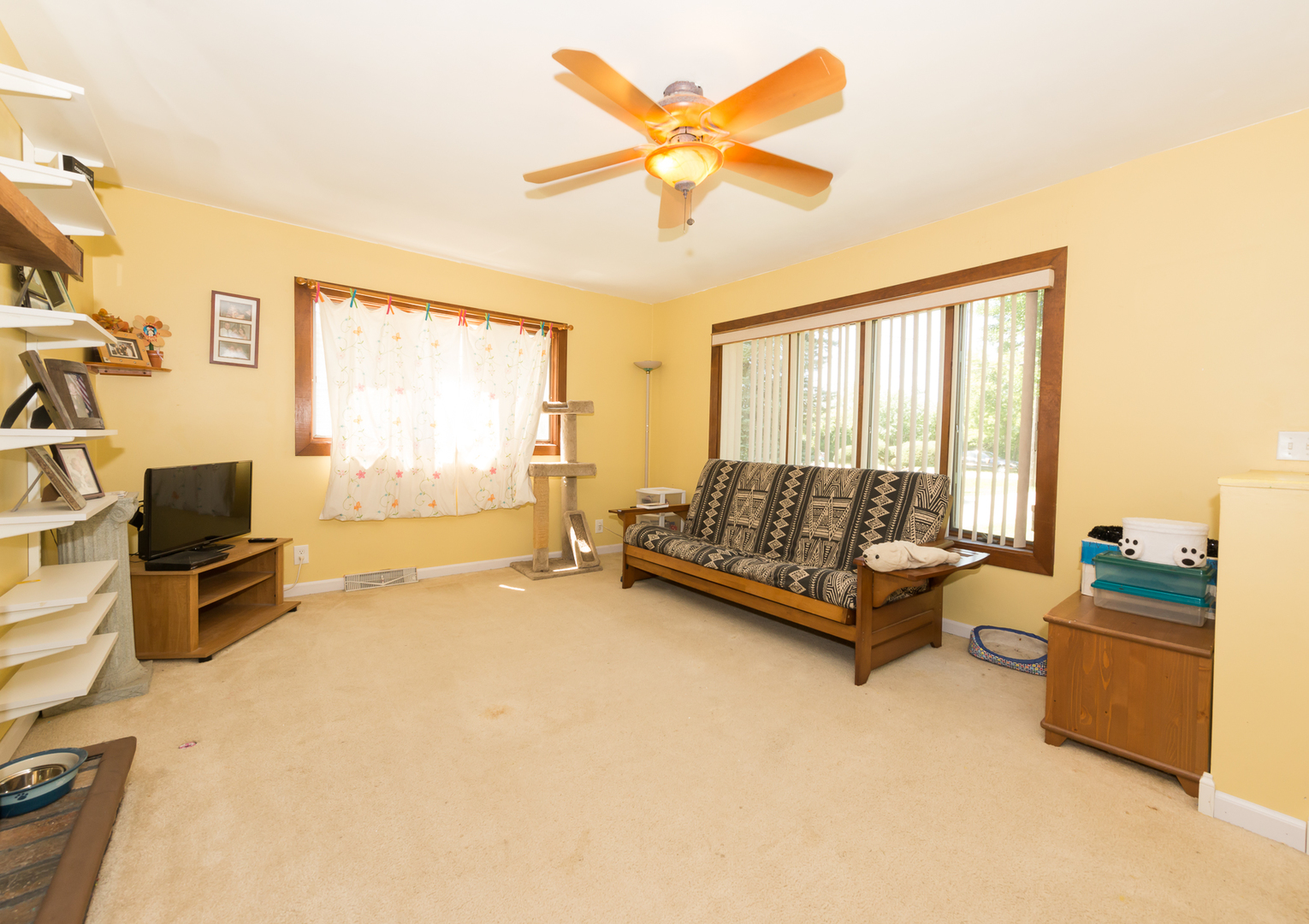 1S183 Valley Road Lombard, IL 60148 - Photo 13 of 25 a living room with furniture and a flat screen tv