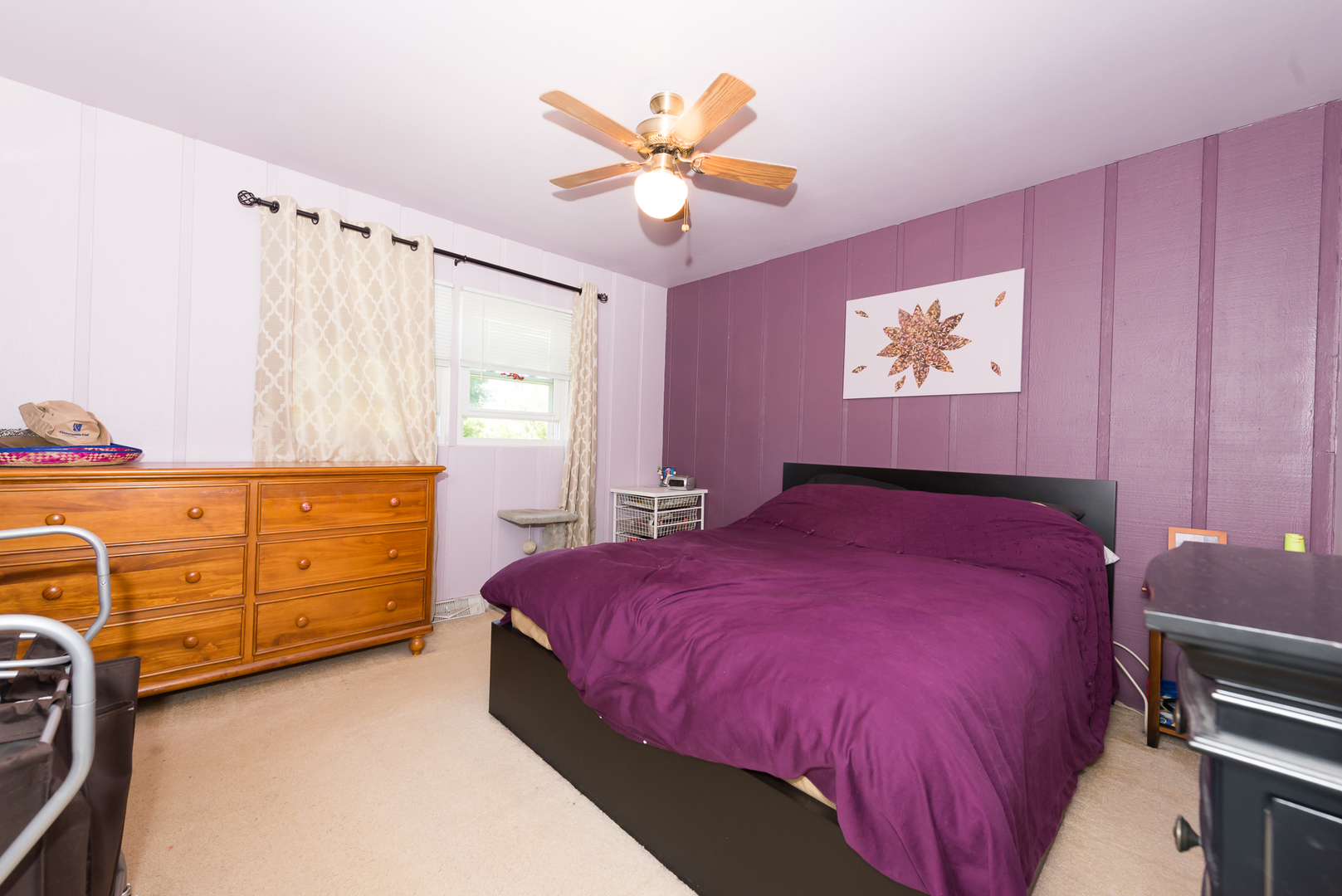 1S183 Valley Road Lombard, IL 60148 - Photo 14 of 25 a bedroom with a bed and a chandelier