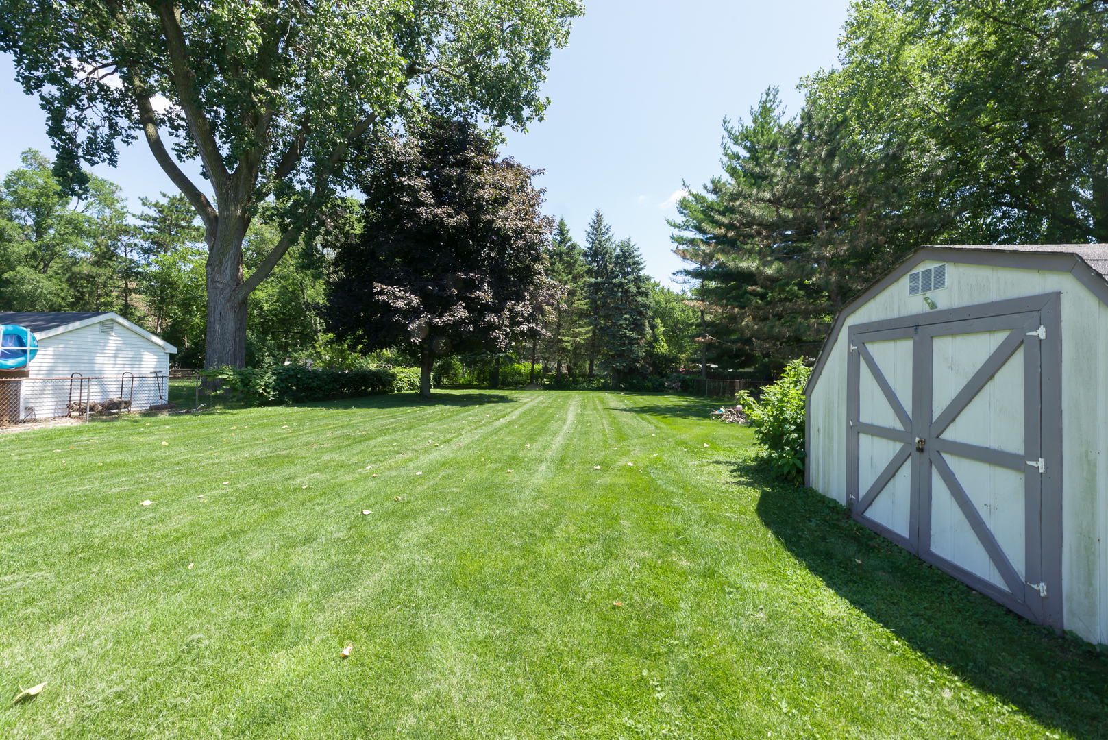 1S183 Valley Road Lombard, IL 60148 - Photo 24 of 25 a view of backyard with trampoline