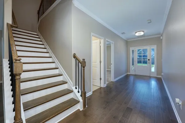 a view of entryway with wooden floor