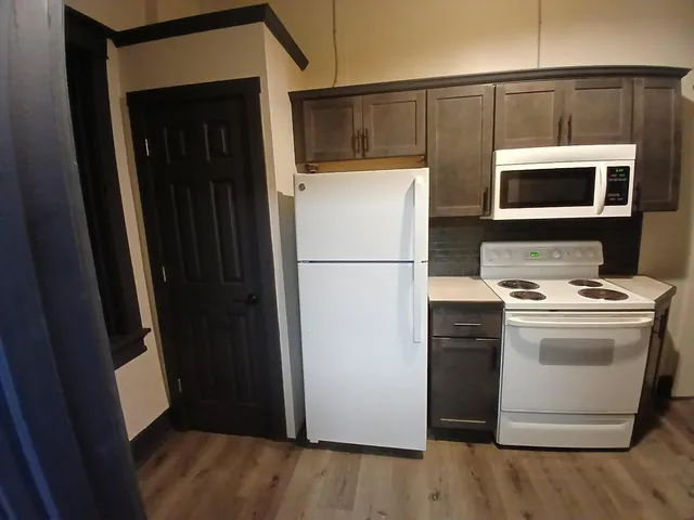 a utility room with washer and dryer