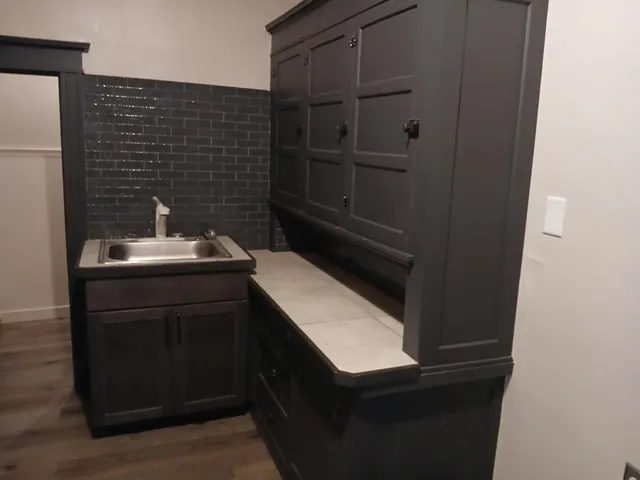 a bathroom with a sink toilet and vanity