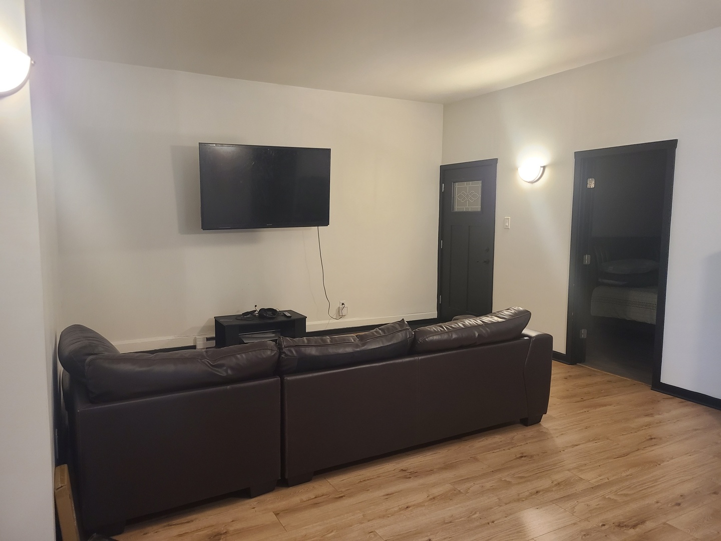 1818 4th Street Peru, IL 61354 - Photo 4 of 36 a living room with furniture and a flat screen tv