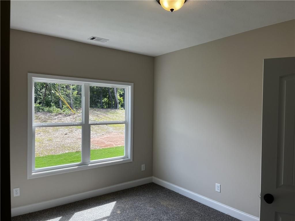 1932 Cochran Ridge Road Hiram, GA 30141 - Photo 19 of 30 an empty room with a window