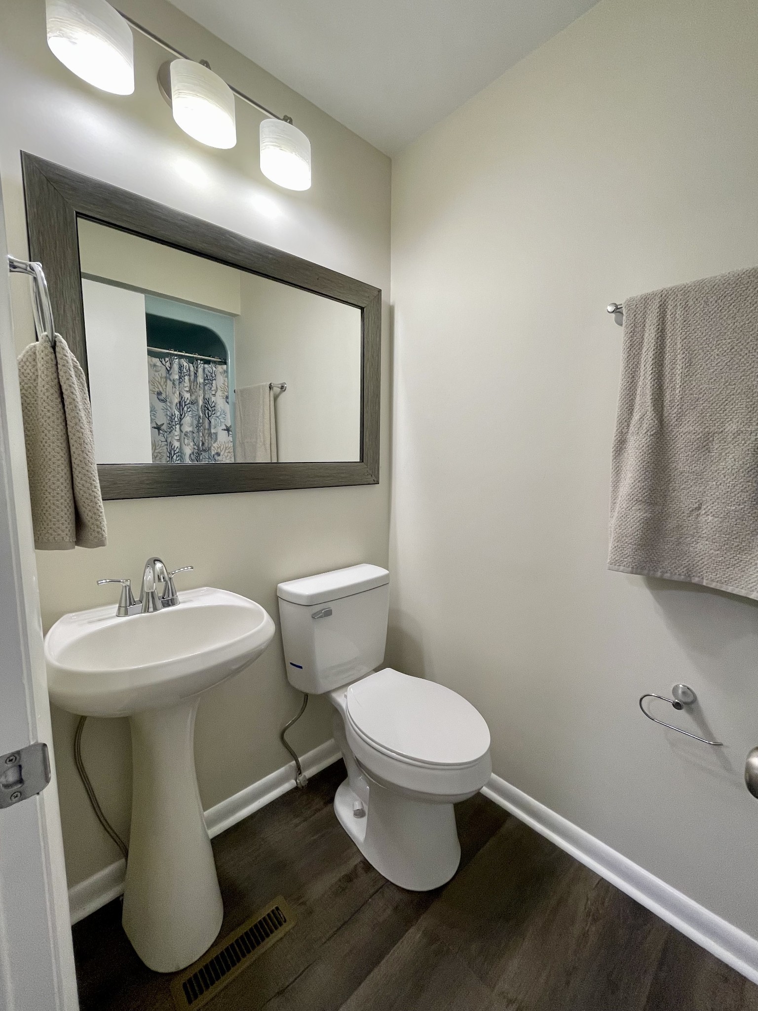 1033 Moore Hollow Road Tennessee Ridge, TN 37178 - Photo 13 of 62 a bathroom with a toilet sink and mirror
