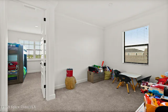 a bedroom with a bed and a shower