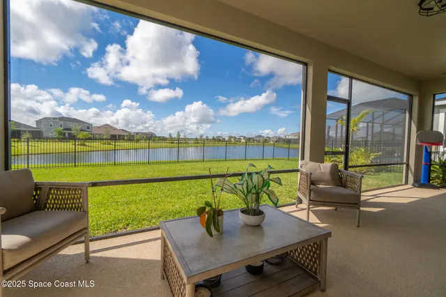 a view of swimming pool with seating
