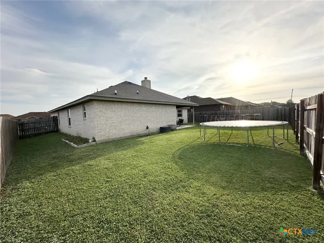 a view of a terrace with a garden