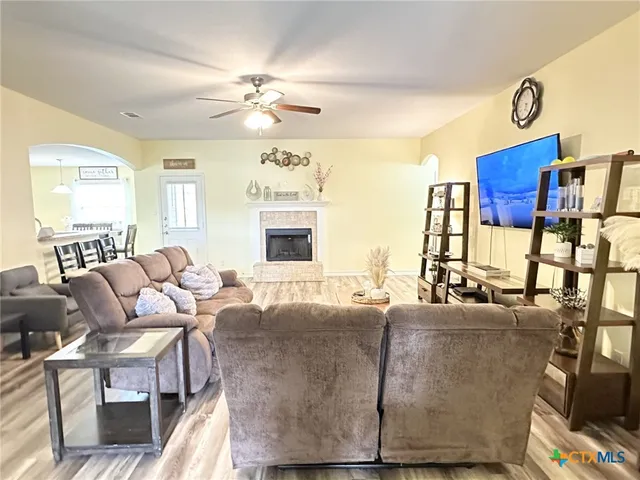 a view of a livingroom with furniture and window