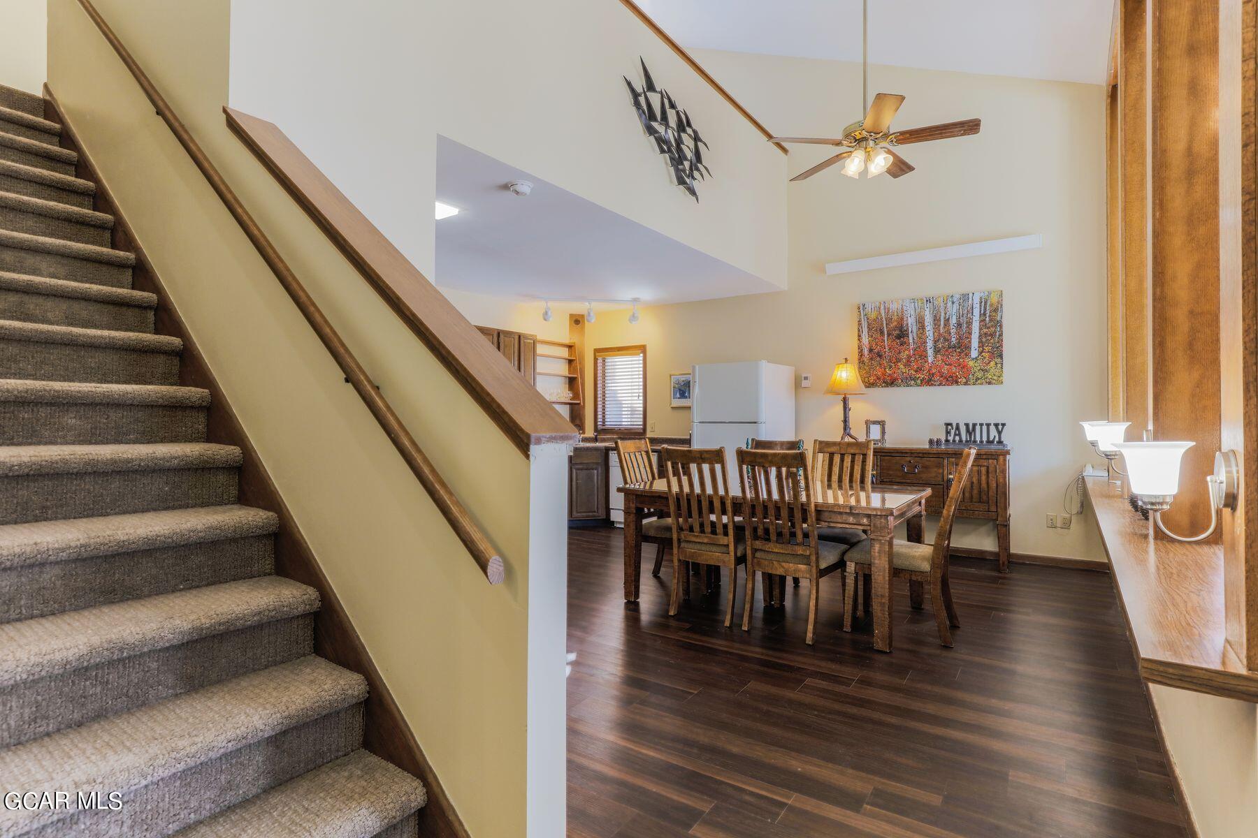 96 Mountainside Drive, Unit B 58 Granby, CO 80446 - Photo 21 of 42 a view of a dining room with furniture and wooden floor
