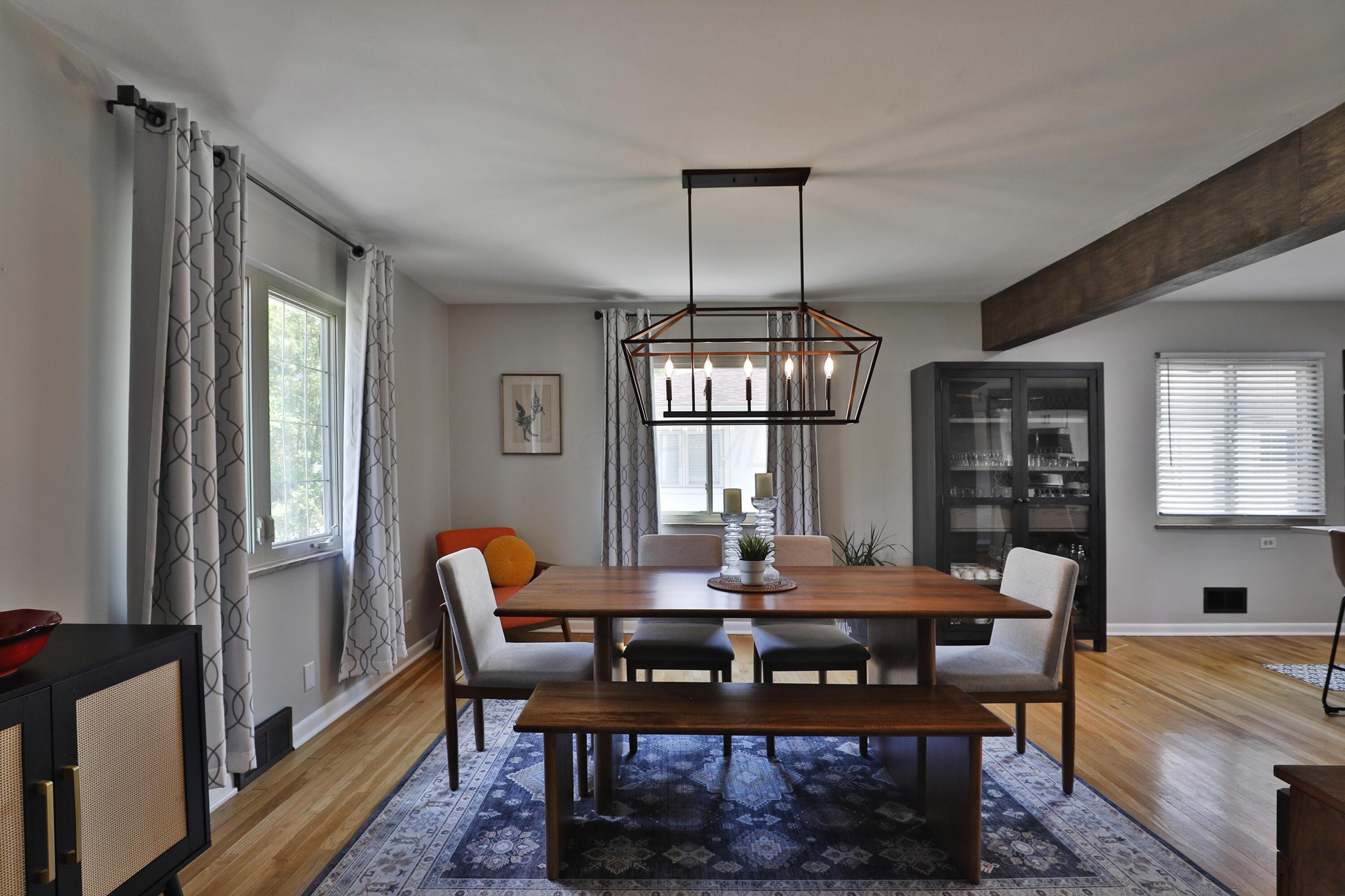 315 South Kellner Road Columbus, OH 43209 - Photo 11 of 51 Contemporary chandelier, wood floors, surrounded by new windows
