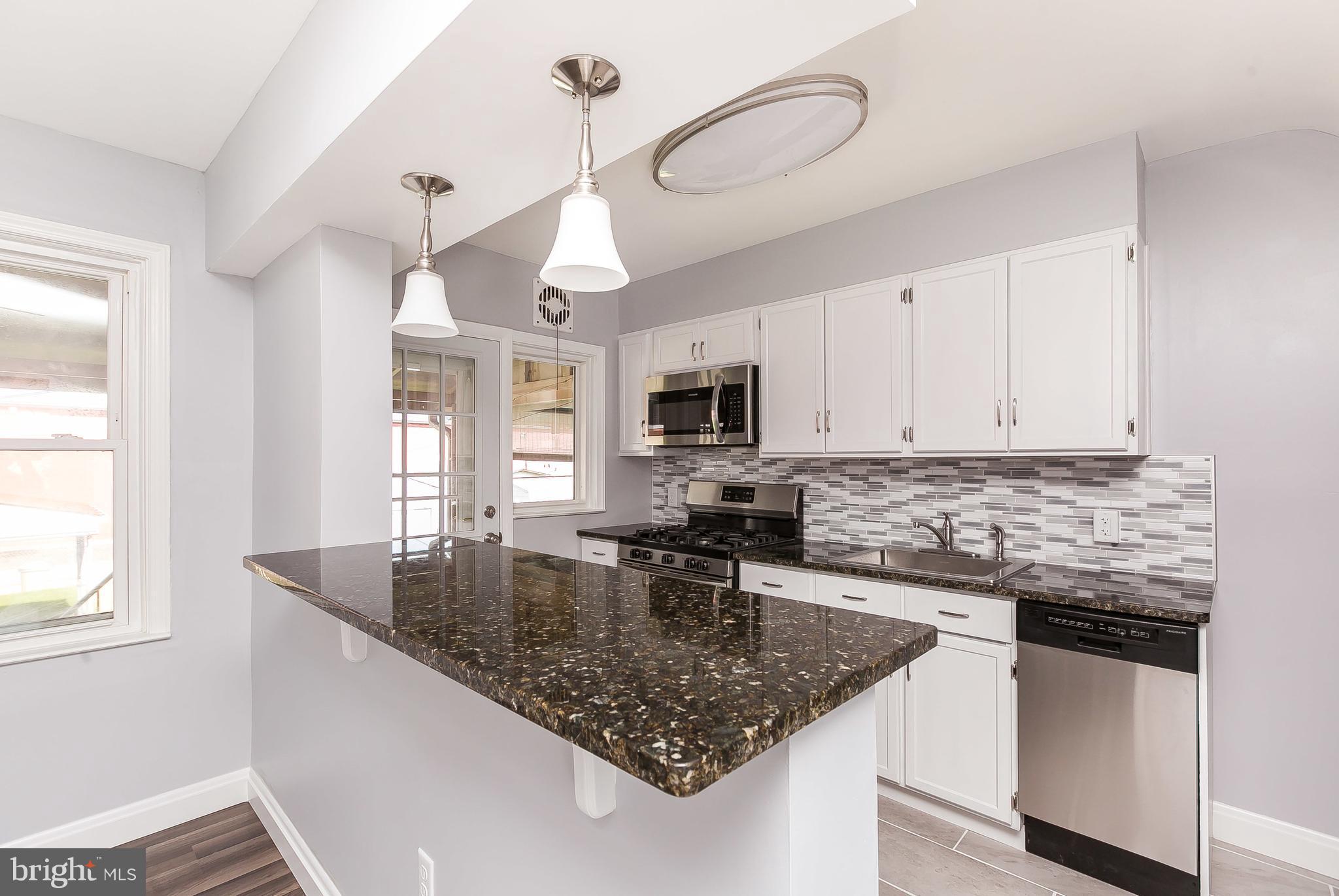 2111 Hawthorne Road Baltimore, MD 21220 - Photo 9 of 30 Granite top breakfast bar