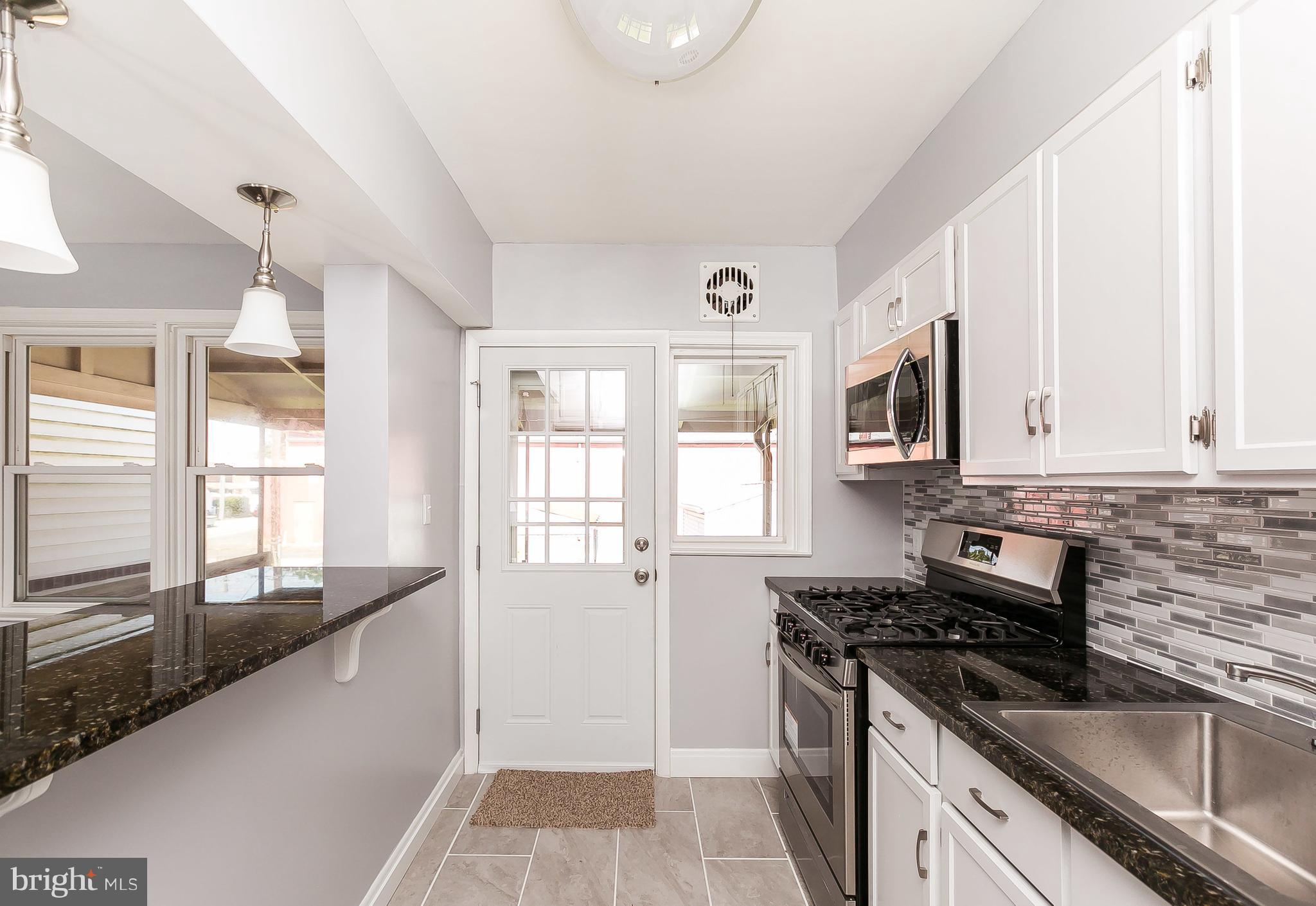 2111 Hawthorne Road Baltimore, MD 21220 - Photo 10 of 30 Stunning renovated galley kitchen