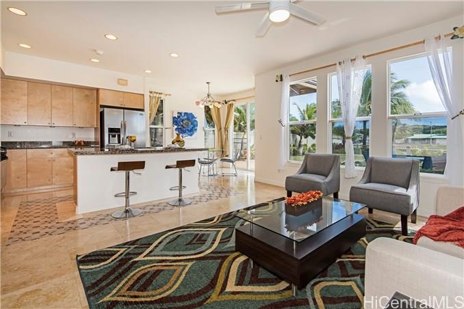 520 Lunalilo Home Road, Unit 361 Honolulu, HI 96825 - Photo 1 of 1 a living room with furniture and a large window