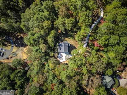 a view of a house with a tree