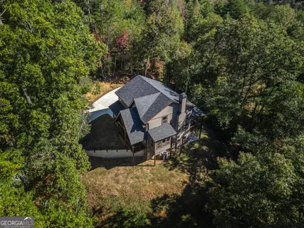 a house view with a backyard space