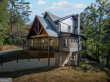 a front view of a house with a porch