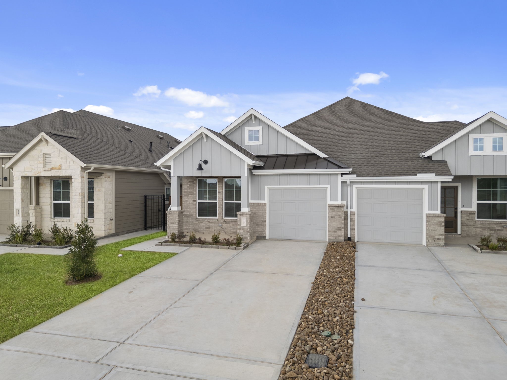 5251 Celestial Court Rosharon, TX 77583 - Photo 4 of 46 a front view of a house with a yard and garage