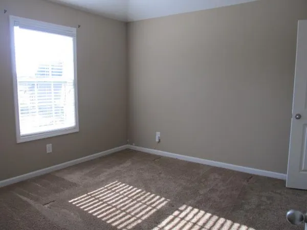 an empty room with a window