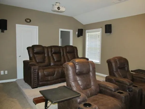 a living room with furniture and a couch