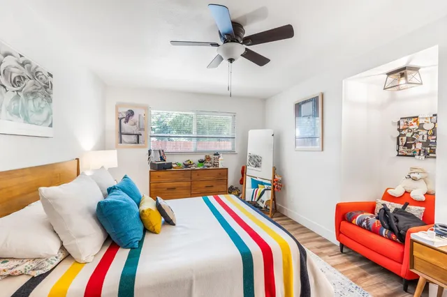 a bed room with a bed and a couch