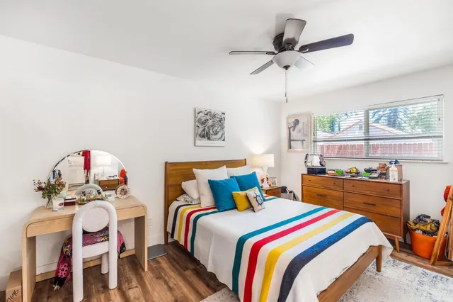 a bedroom with furniture and a bed