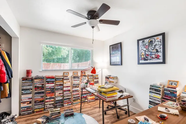 a living room with lots of furniture and a flat screen tv