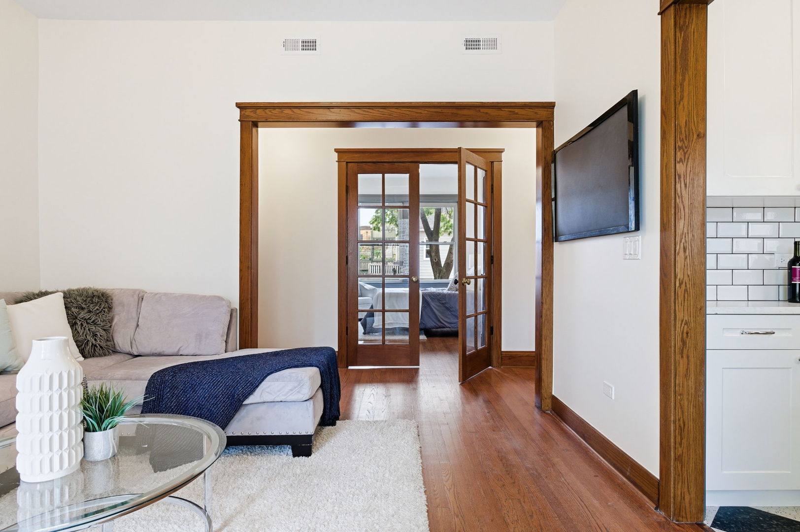 2920 West Altgeld Street, Unit 2 Chicago, IL 60647 - Photo 14 of 22 a living room with furniture and a window