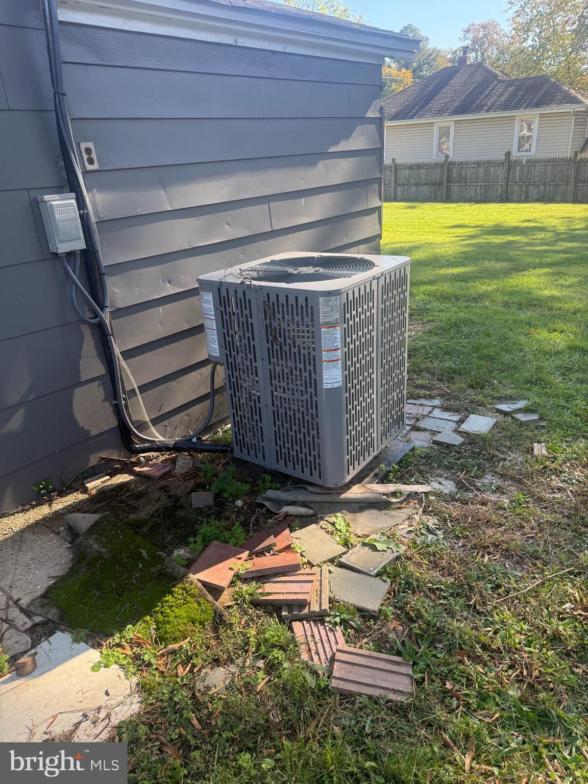 208 68th Place Capitol Heights, MD 20743 - Photo 13 of 15 a view of a backyard with plants and large trees