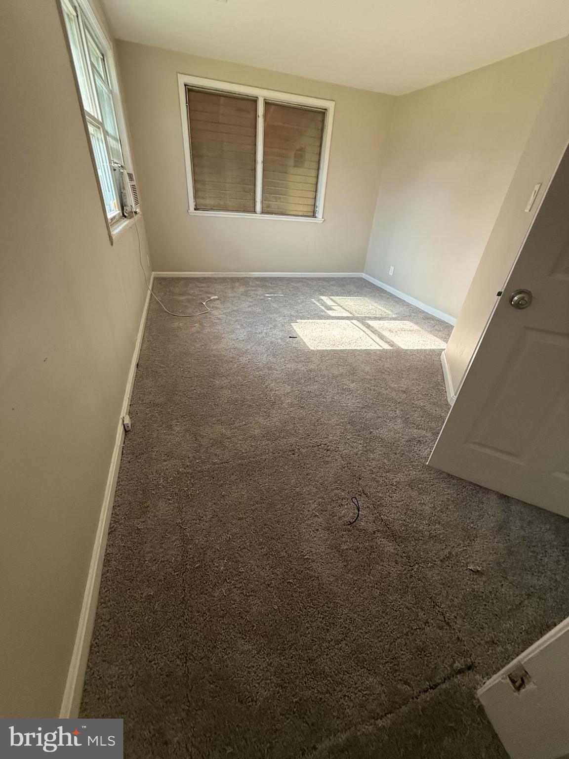 208 68th Place Capitol Heights, MD 20743 - Photo 3 of 15 a view of an empty room with a window