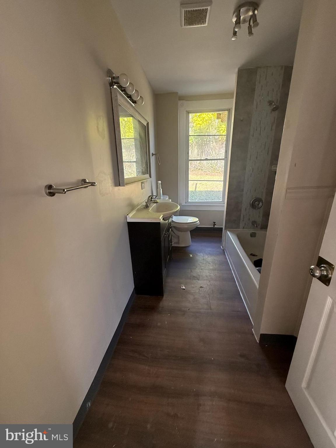 208 68th Place Capitol Heights, MD 20743 - Photo 4 of 15 a view of an entryway with wooden floor