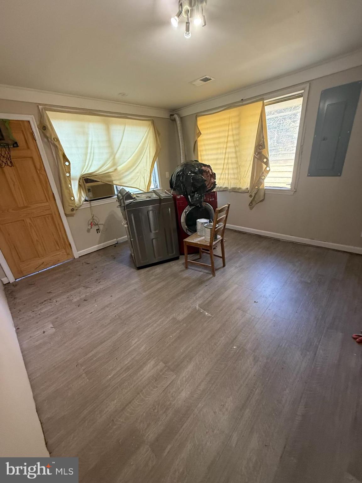 208 68th Place Capitol Heights, MD 20743 - Photo 6 of 15 a living room with furniture and a flat screen tv